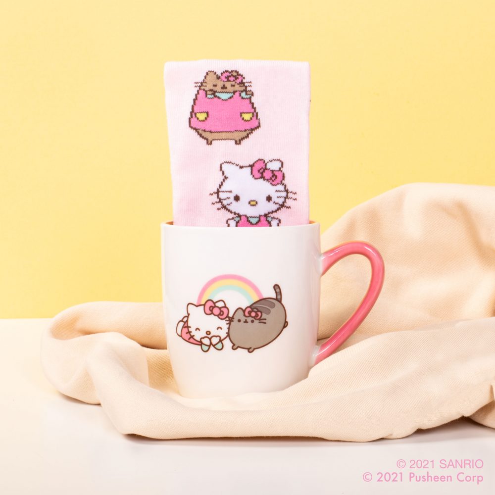 https://www.pastel-palace.com/wp-content/uploads/2021/11/4336_Hello-Kitty-Pusheen-Sock-in-a-Mug-Lifestyle-4-scaled.jpg